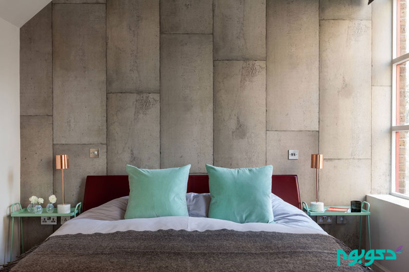 teal-cushions-concrete-wall-industrial-bedroom.jpg