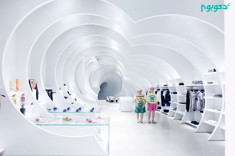 طراحی داخلی فروشگاه لباس مدرن و تونلی شکل